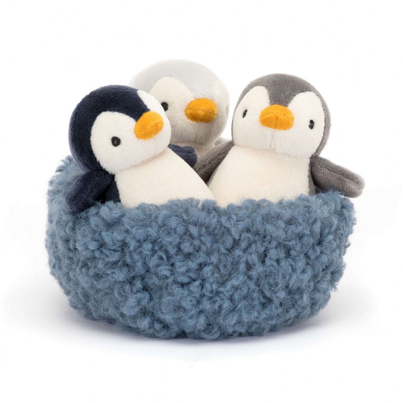 Trio de pingouins dans leur nid Trio de pingouins dans leur nid